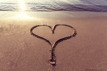 heart shape on sand at beach