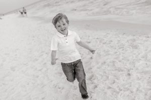 Child running on the beach