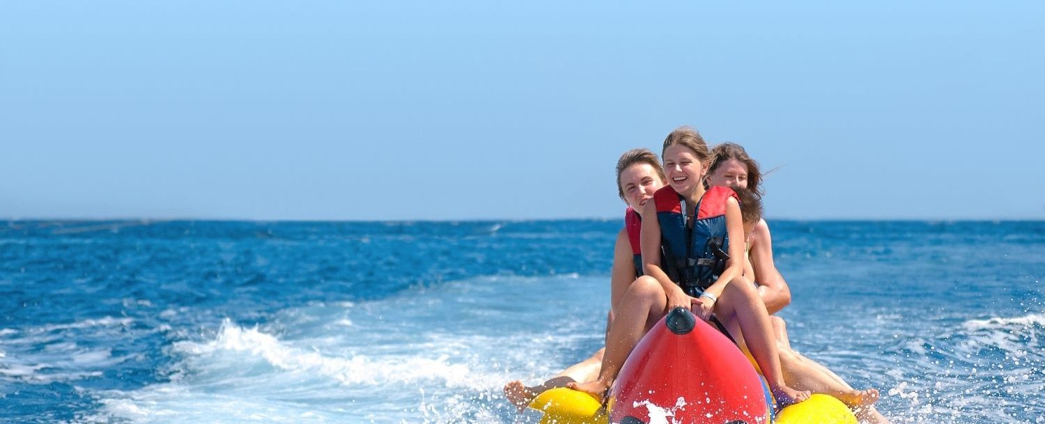 Family riding through the ocean on a Destin boat tour