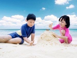 kids building sand castle