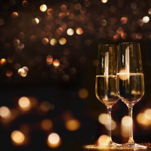 champagne holidays sparkling wine with Christmas lights background