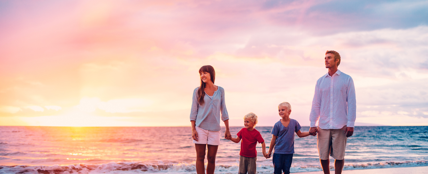 Family walking on beach