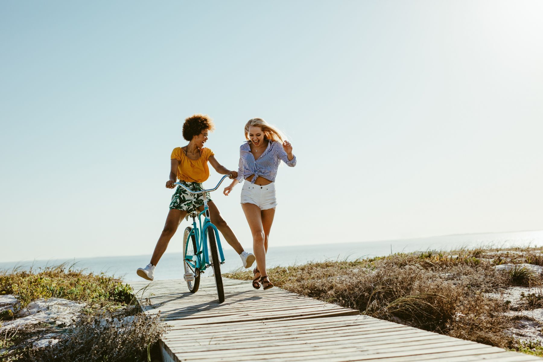 friends biking near the beach in Destin