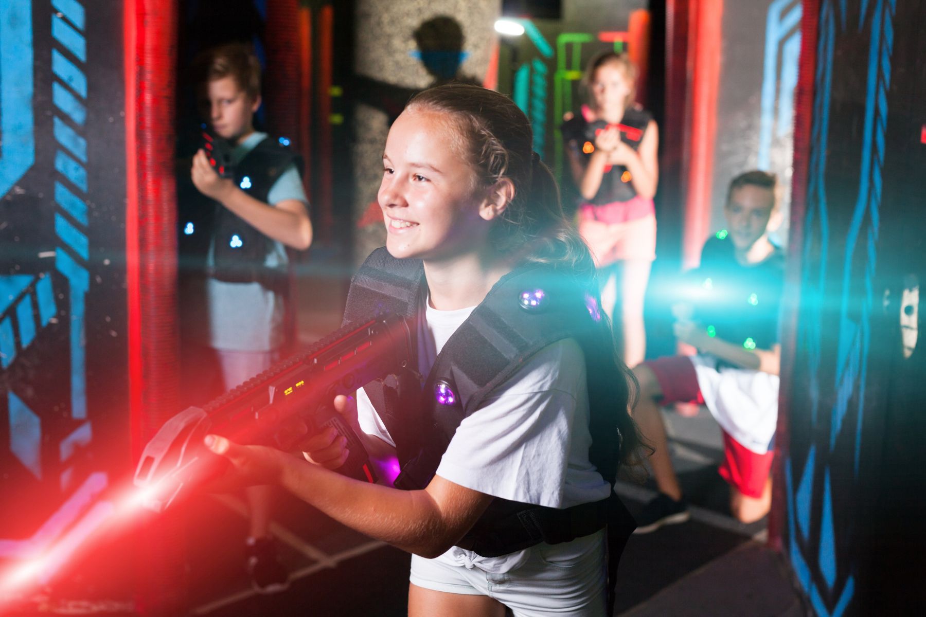 group of children playing laser tag