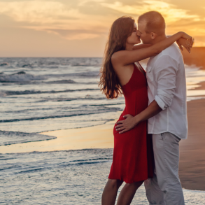 couple kissing on the beach