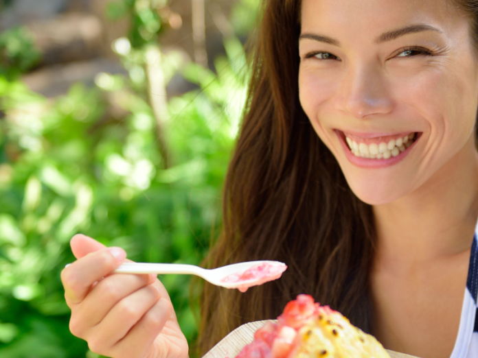 woman eating shave ice