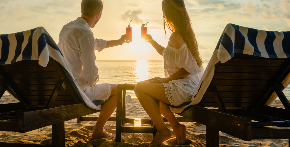 30a & destin Labor Day weekend, couple on beach at sunset toasting
